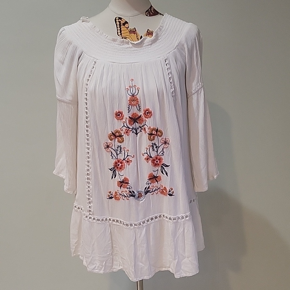 TAYLOR & SAGE boho style top.  Emboidered with orange flowers.  Size is Large.